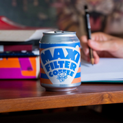 Can of maxi filter coffee on desk